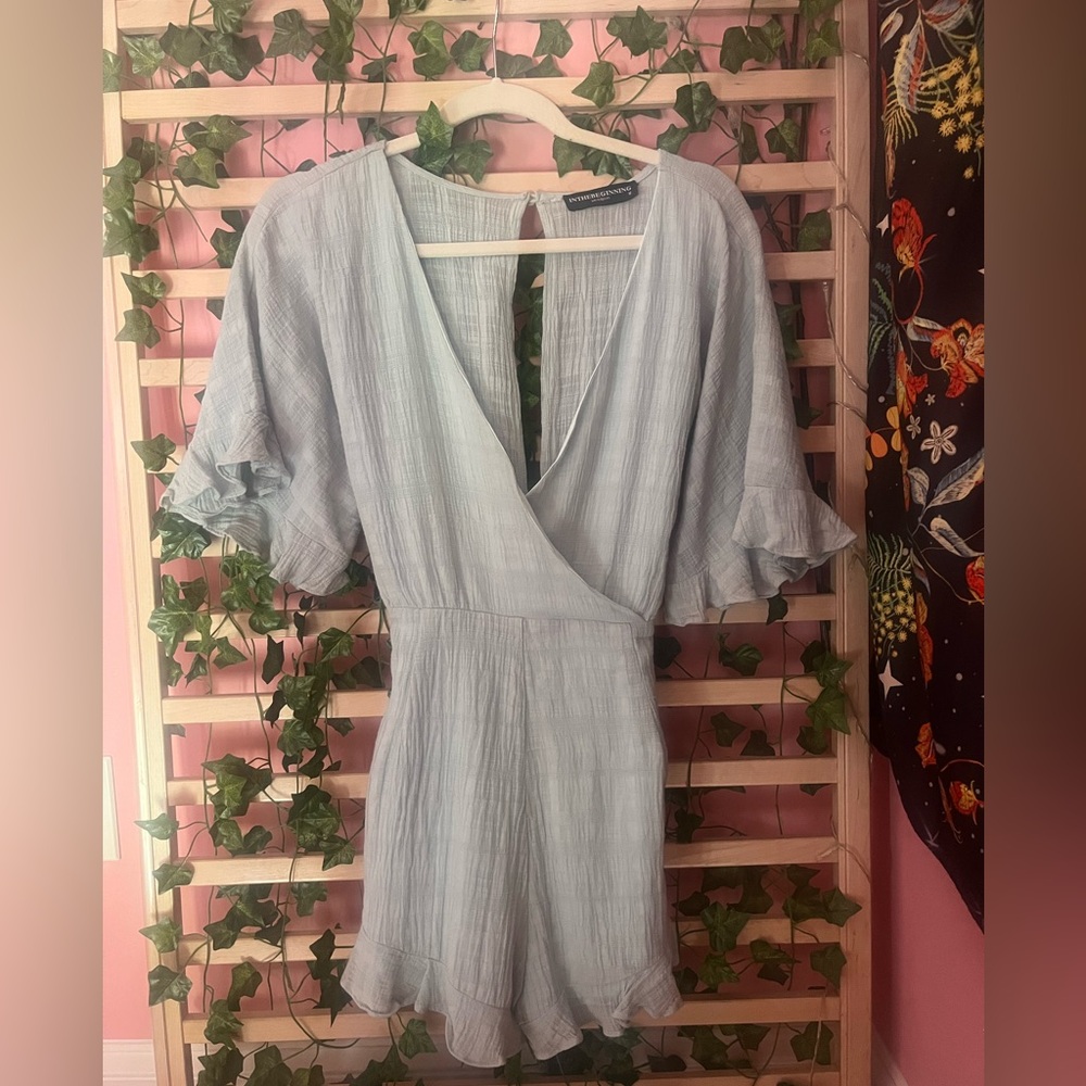 Blue Wrap-Style Romper with Cinched Waist
